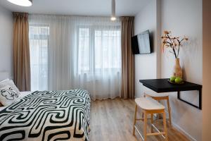 Design Studio Riga With Double Bed And Quiet Yard View