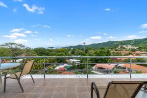 Modern Top-Floor Condo with Panoramic Views and Community Pool
