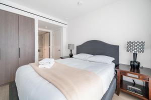 Urban Retreat 2BR Condo with Stunning City View