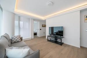 Urban Retreat 2BR Condo with Stunning City View