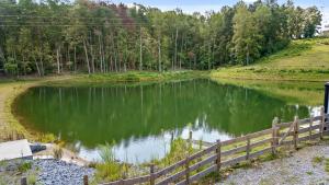 The Yurt at Paradise Pointe with a hot tub fire pit & Grill
