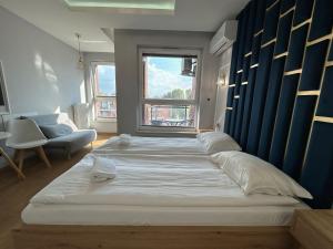 Bastion Wałowa Modern Apartments by MC APART