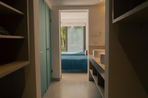 Bright 2BR Apartment with Terrace & Pool, Lorena Ochoa Residences