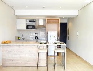 Brand new and cozy loft minutes from the Airport