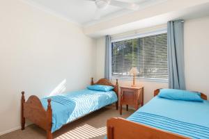 Mortimer - Rainbow Shores. Walk to beach