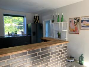 Lækker lejlighed med lille have