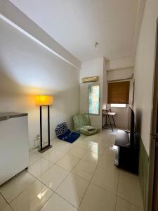 The Darmawan Room at Apartement Puncak Permai