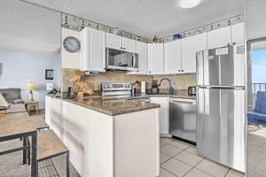 Cozy Oceanfront Condo with Heated Pools & Views