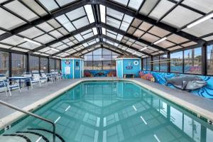 Cozy Oceanfront Condo with Heated Pools & Views