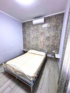 Camera matrimoniale elegante e confortevole con aria condizionata