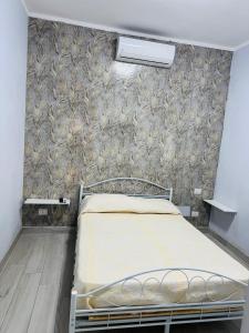 Camera matrimoniale elegante e confortevole con aria condizionata