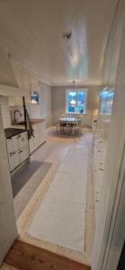 Kärleksfullt renoverat sekelskifteshus på bondgård