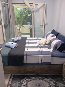 Ηome & Garden with parking close to Olympic Stadium