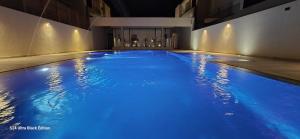 The Cozy Nook- luxury, privacy, with a pool and gym