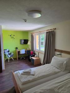 Grischalodge das Hotel mit Bergblick seit 1929 - schlicht, preiswert und mit einem touch Nostalgie