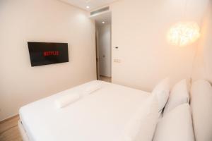 Le Doux Nuage de Tanger - Cosy appart, Résidence Securisée avec Piscine, Jeux pour enfants et Terrain de foot, Parking, AC, WIFI, IPTV