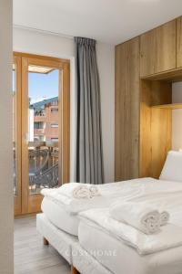 Le Rocher l Pied des pistes l By CosyHome