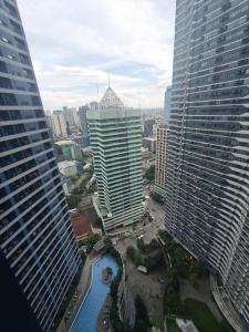 Iris Affordable and Neat Staycation at Air Residences Makati