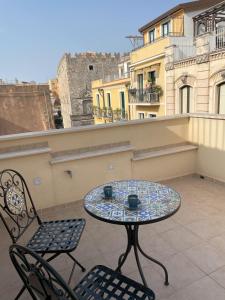 Casa Corso is an Elegant City Center House with Terrace Views of Taormina Main Street