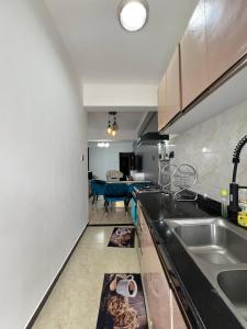 Stylish 1 BDRM with Extra Bed, Gym and Parking in Kilimani