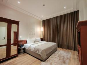 Baithans 24 Furnished Apartments Hotel LLC