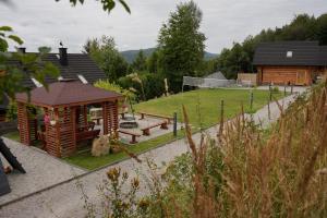 Domek z bali drewnianych w górach Jacuzzi & Balia - Osada Chełm