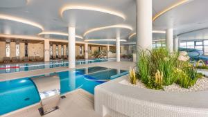 Apartament B014 White Moon - Basen Bawialnia Fitnes Parking w CENIE Polanki Aqua - Holiday City