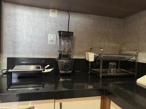 Dois quartos em local estratégico