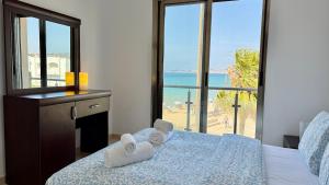 Sea facing Feet in the water & Restaurants, TGV