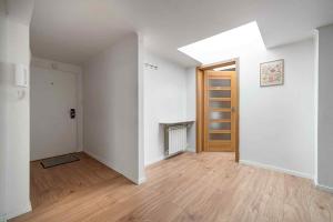 Large apartment in the center of Warsaw by P&M