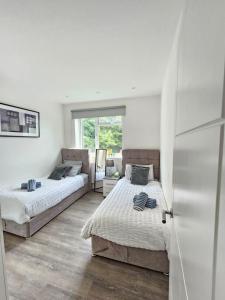 Modern 2BR in West Hendon - Parking -Easy Commute
