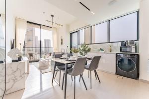 Minutes from Circle Mall, Grocery Stores & Bus Stop 2BR with Mini Private Pool on Balcony, Binghatti Tulip, Jumeirah Village Circle by Deluxe Holiday Homes