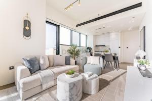 Minutes from Circle Mall, Grocery Stores & Bus Stop 2BR with Mini Private Pool on Balcony, Binghatti Tulip, Jumeirah Village Circle by Deluxe Holiday Homes