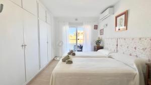 Magnífico Ático 4 hab frente a la playa con piscinas parking incluido por keywise