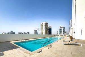 Modern 2BR with Private Pool, Near Circle Mall And Quick Access from Al Khail Road, Binghatti Tulip, JVC by Deluxe Holiday Homes