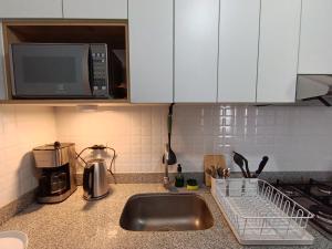 Minidep con cama Queen y Netflix