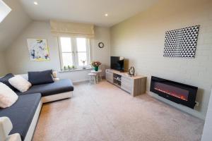 SHAMBALLA logies nieuw en zeer verzorgd appartement met voortuin en terras