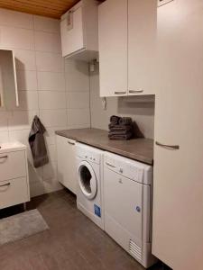 A one-bedroom apartment with a sauna near the center