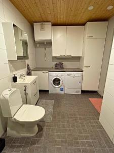 A one-bedroom apartment with a sauna near the center