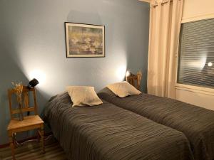 A one-bedroom apartment with a sauna near the center