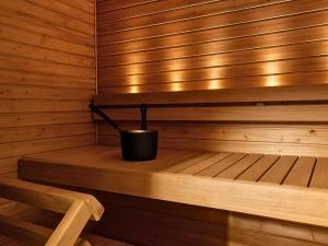 A one-bedroom apartment with a sauna near the center