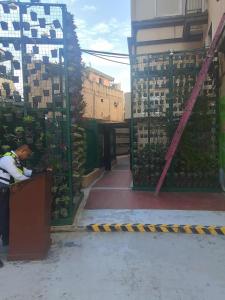 1 bedroom condo unit for 4 with balcony, pool, WIFI at Newport across NAIA T3