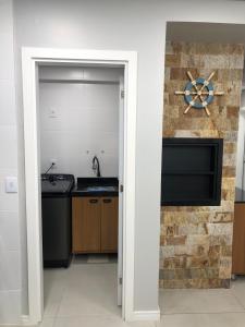 LINDO Apartamento no CENTRO de TRAMANDAI com PISCINA aquecida