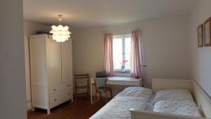 Sonnige 2-Zimmer Wohnung mit Terrasse und Garten