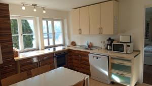 Sonnige 2-Zimmer Wohnung mit Terrasse und Garten