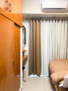 1BR- Axinite walking distance to MOA, PICC, SMX, Worldtrade near NAIA and Star City