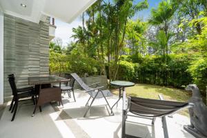 Naithon beachfront apartment-pool gym restaurant