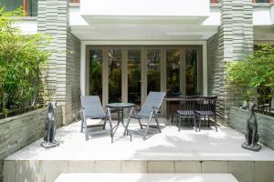 Naithon beachfront apartment-pool gym restaurant