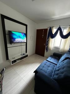 Apartamento em Condomínio Beverly Hills Praia de Vista Linda - Bertioga com Estacionamento e Piscina