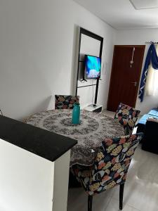 Apartamento em Condomínio Beverly Hills Praia de Vista Linda - Bertioga com Estacionamento e Piscina